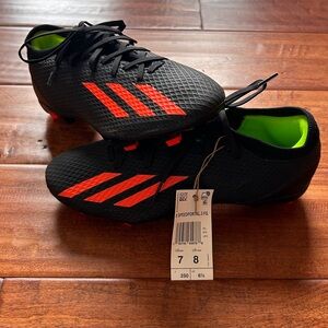 adidas Black Soccer Cleats with Red Stripes and Neon Green Lining
